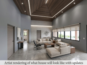 Spacious living room with high wooden ceiling and large windows.