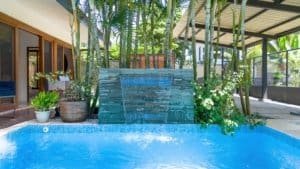 Modern home with pool and lush tropical garden in Uvita, Costa Rica.