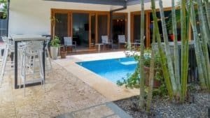 Modern home with pool and outdoor seating near Uvita beach.