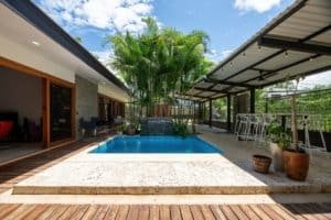 Modern Costa Rican home with pool, tropical garden, and outdoor lounge.