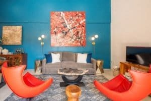 Modern living room with colorful decor and comfortable seating in Uvita.