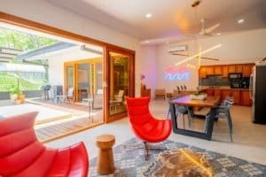Modern interior with open kitchen and outdoor patio in Uvita.