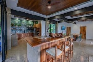 Spacious modern kitchen with wooden accents and ocean view in Dominical.