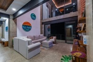 Contemporary living room with ocean view, stylish decor, and cozy seating area.