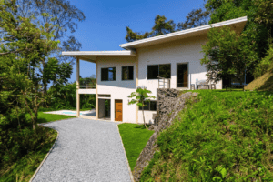 Contemporary Costa Rica home with ocean view and lush surroundings.