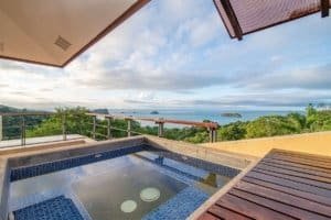 Balinese-inspired home with ocean view and hot tub in Dominical, Costa Rica.