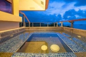 Balinese-style home with ocean view and private hot tub in Dominical.