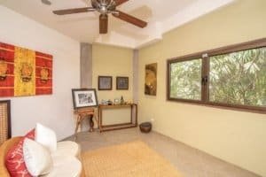 Spacious living room with tropical view and elegant decor in Dominical.