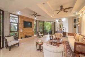 Spacious Balinese-inspired living room with ocean view and modern decor.