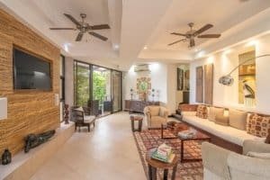 Spacious Balinese-inspired living room with ocean view and modern decor.