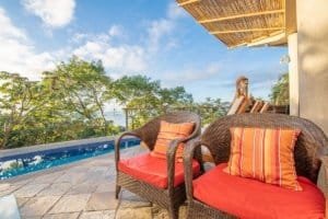 Balinese-style outdoor seating with ocean view in Dominical, Costa Rica.