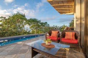 Luxury Balinese-style home with ocean view, outdoor seating and pool in Dominical.