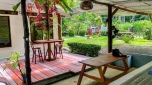 Beautiful outdoor living space with garden, deck, and lush greenery in Costa Rica.