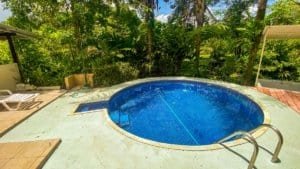 Fully renovated Costa Rican-style home with pool and lush surroundings.