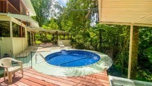 Fully renovated Costa Rican-style home with pool and lush surroundings.