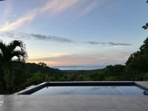 Stunning ocean view from a luxury home surrounded by rainforest in Dominical.