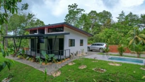 Contemporary house with pool and lush garden in Dominical, Costa Rica.