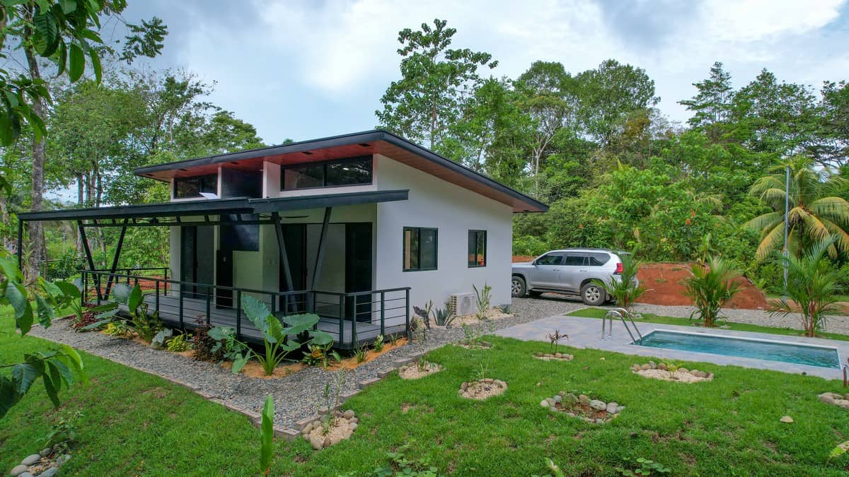 Contemporary house with pool and lush garden in Dominical, Costa Rica.
