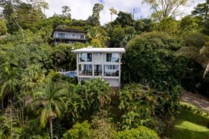 Contemporary jungle home with panoramic views and lush greenery in Dominical.