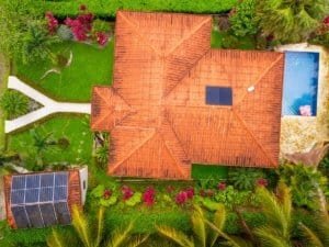Aerial view of a modern jungle home with a pool in Dominical, Costa Rica.