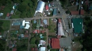 Aerial view of land parcels and a home in Dominical, Costa Rica.