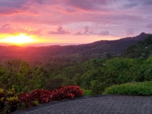 Beautiful sunset view over lush rainforest in Dominical, Costa Rica.