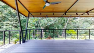 Balcony overlooking lush tropical forest in Dominical, Costa Rica.