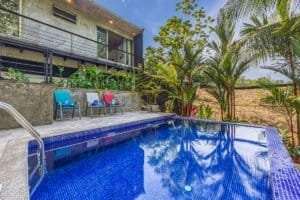 Luxury pool with tropical plants in Dominical Costa Rica.