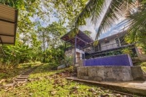 Luxury home in Dominical Costa Rica with pool and lush garden.