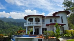 Beautiful Spanish Colonial-style house with ocean and mountain views in Dominical.