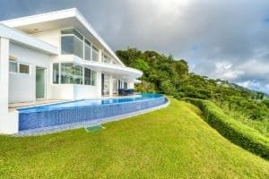 Modern house with infinity pool overlooking lush jungle in Dominical.