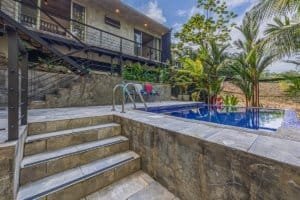 Modern villa with private pool and lush tropical garden in Dominical.