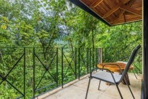 Balcony overlooking lush tropical jungle in Dominical, Costa Rica.