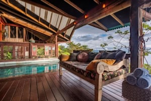 Relaxing outdoor lounge with ocean view and tropical surroundings in Dominical.