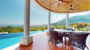 Elegant outdoor patio with mountain and ocean views in Dominical.