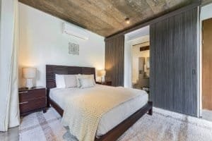 Contemporary bedroom with minimalist decor in Dominical Costa Rica.