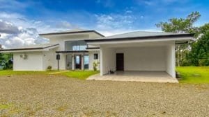 Modern Costa Rican luxury home with panoramic ocean and mountain views.