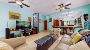 Bright, airy living room with modern furniture and tropical decor in Dominical.