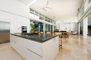 Bright open-concept kitchen and living space with ocean views in Dominical.