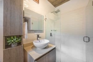 Contemporary bathroom with walk-in shower and stylish sink in Costa Rica property.