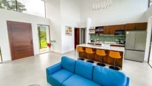 Spacious modern kitchen with ocean and mountain views in Dominical, Costa Rica.