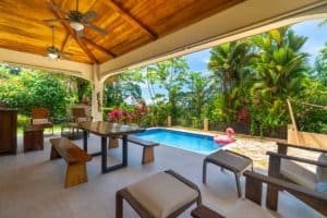 Luxury jungle home with pool, tropical garden, and ocean view in Dominical.