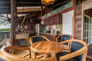 Cozy kitchen and dining area with ocean view in Dominical, Costa Rica.