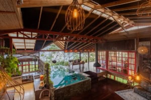 Interior of a tropical ocean view home with open design and natural materials.