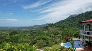 Beautiful mountain and ocean view from a Costa Rican estate with pool.