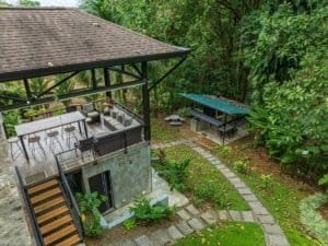 Outdoor patio and garden area at Dominical real estate property in Costa Rica.