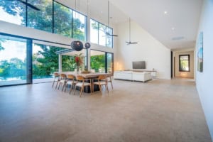 Spacious living room with large windows and ocean view in Dominical.