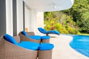 Comfortable outdoor seating with pool and jungle view in Dominical.