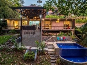 Beautiful Costa Rican house with pool, garden, and outdoor living space.