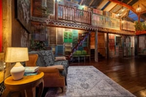 Cozy rustic living room with wooden decor and colorful accents in Dominical.